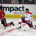 Troy Brouwer stretches in tandem with Chicago’s Dylan Olsen. It may have been a coincidence. (Ben Sumner)