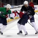 Karl Alzner gets jumped by teammates. (Alena Schwarz)