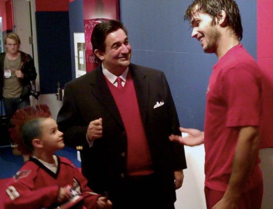 Leonsis introduces his guest to Jose Theodore