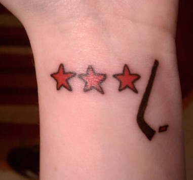 caps tattoo